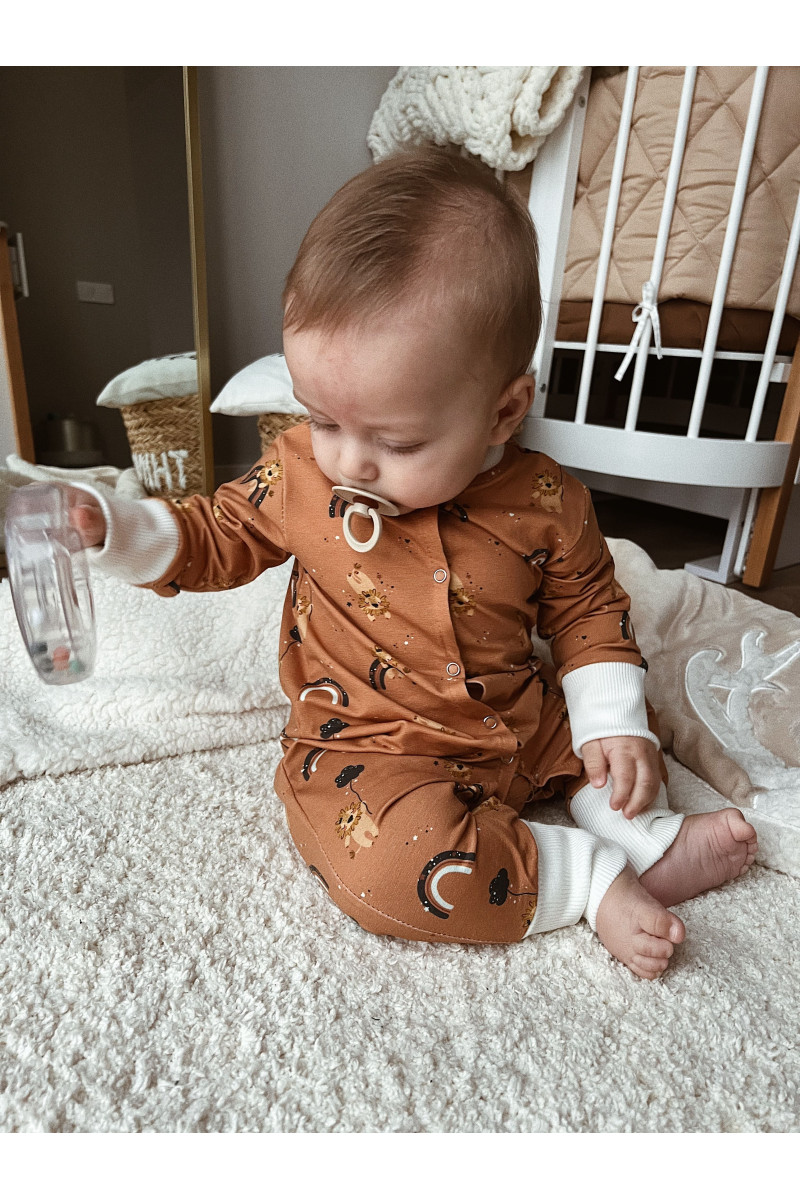 Pyjama Grenouillère bébé en coton imprimé de lions Pyjama Grenouillère bébé en coton imprimé de lions