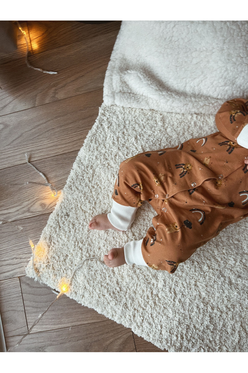 Pyjama Grenouillère bébé en coton imprimé de lions
